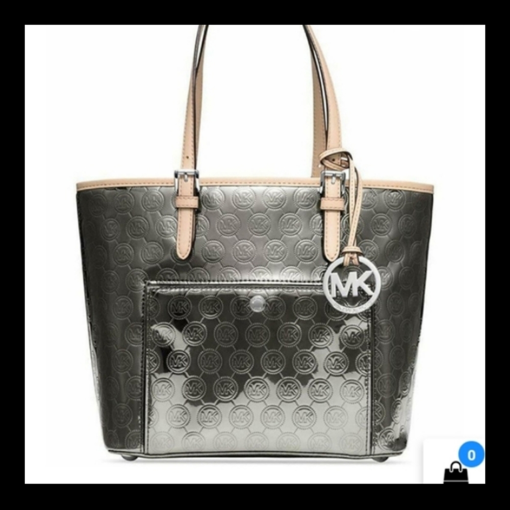 Medium Micheal kors jet-set metallic goldish bag not perfect condition